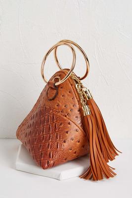 tasseled fortune cookie clutch