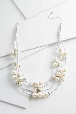 metallic cord and pearl necklace